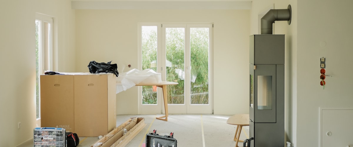 Room under renovation with construction tools and materials